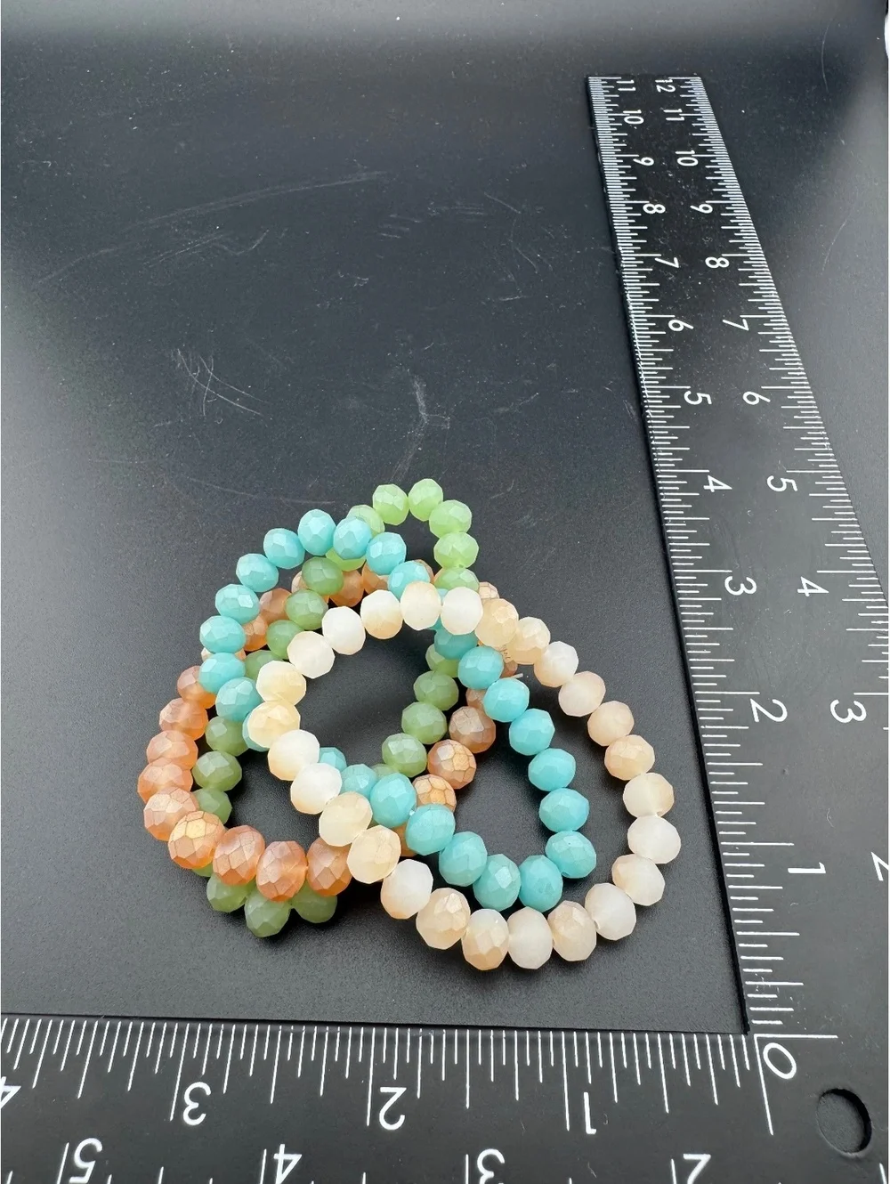 Set of Four Faceted Beaded Stretch Bracelets in Pastel Tones